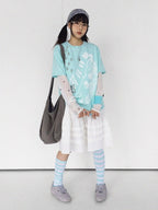 Mint Green Crew Neck Tee with Distressed Print - innomoood - image 3